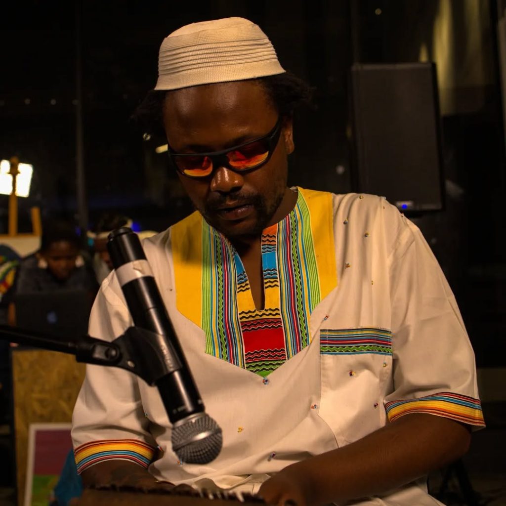 Soweto Folk Musician Safe Energy playing imbira